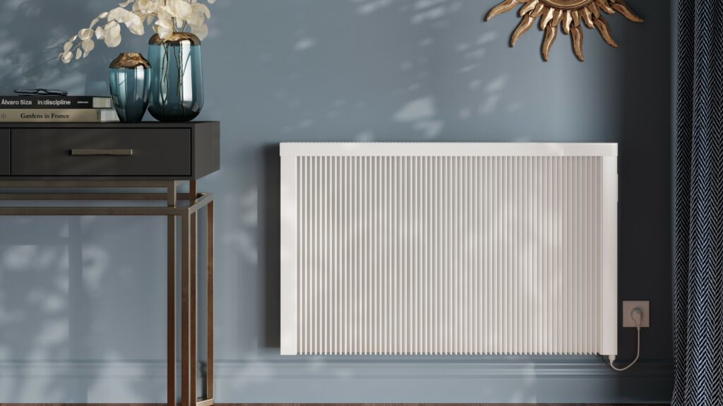 RadTherm electric radiator on a blue wall